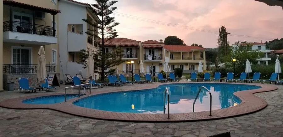 Studios and pool at sunset