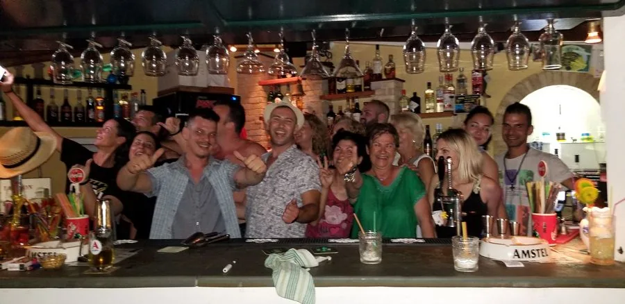 Guests gathered for a Greek evening