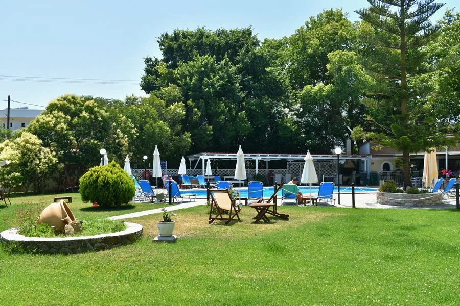 Garden lawn and poolside umbrellas
