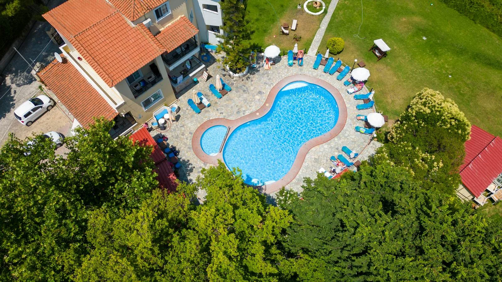 Aerial view of Edem Studios, the two swimming pools and garden