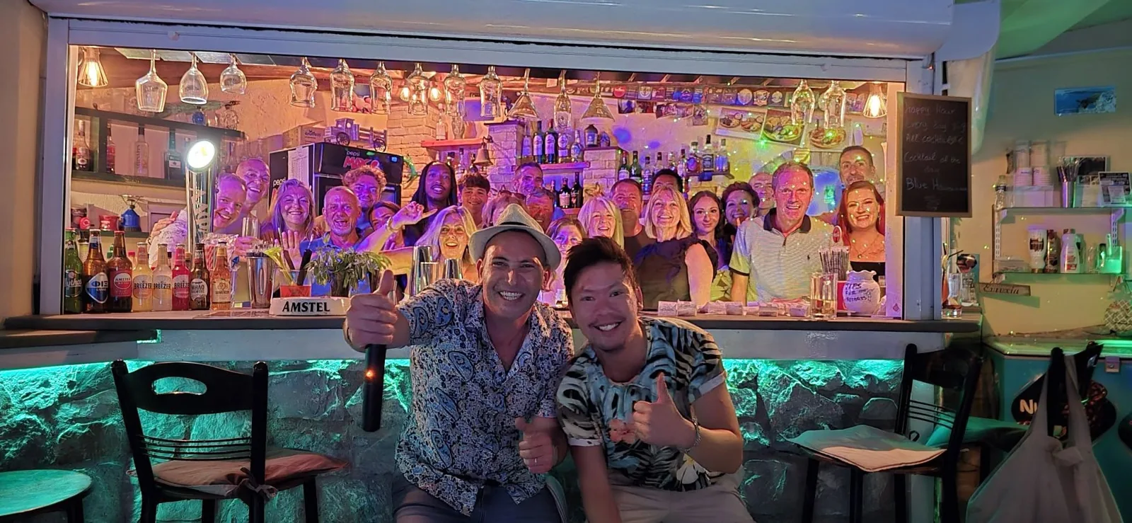 Guests gathered at the open Edem pool bar